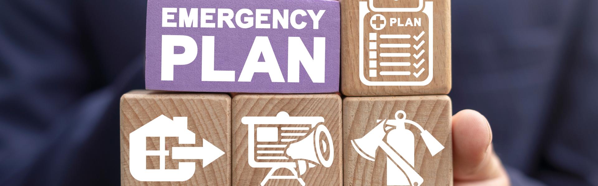 A stack of blocks with emergency symbols on them.
