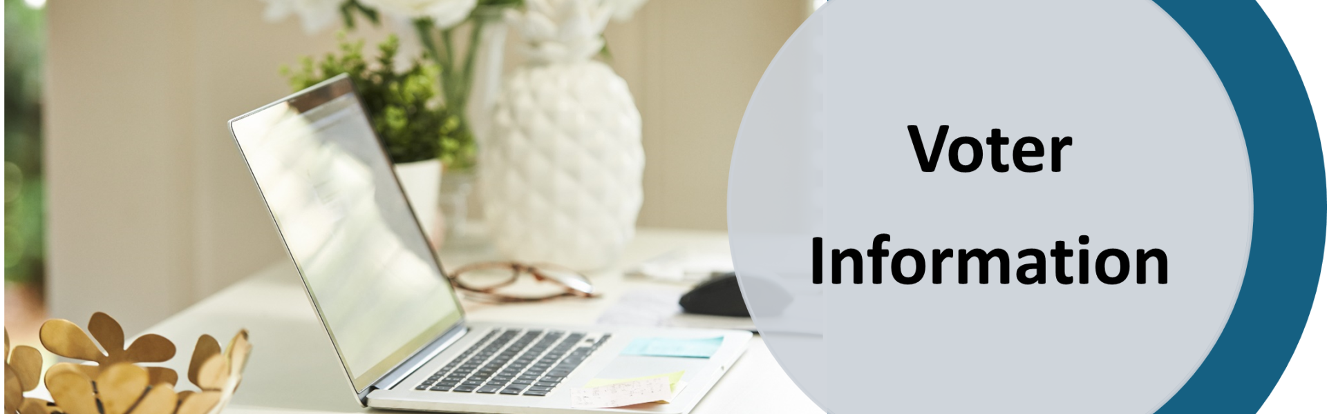 image of computer cell phone flowers and desk