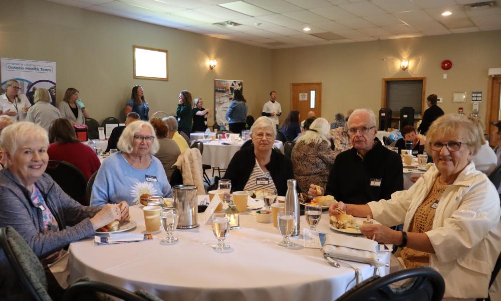 Table of Senior Symposium participants enjoying lunch