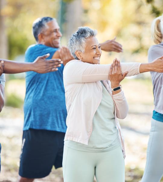 A group of seniors exercising together.