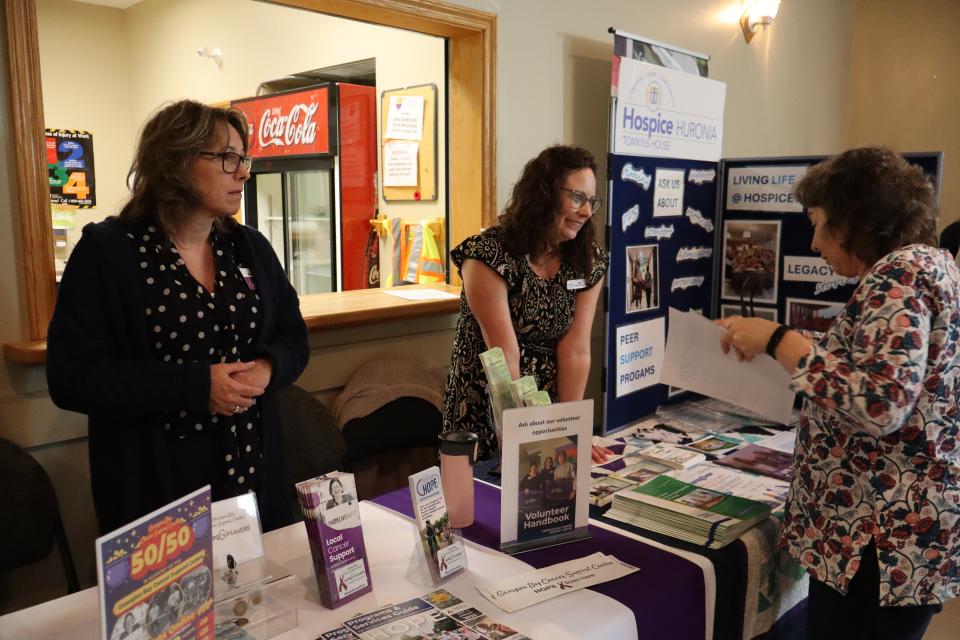 Representatives from the Georguan Bay Cancer Support Centre and Hospice Huronia interacting with Senior Symposium participants