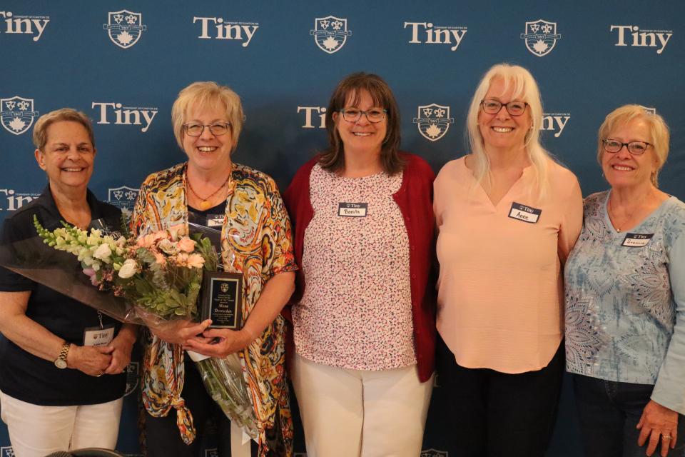 Senior Advisory Committee Chair, Senior of the Year award winner Mona Desroches, and Mona's sisters celebrating her award
