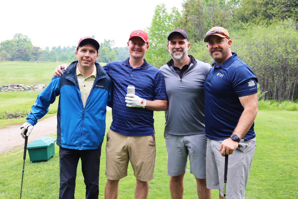 Golf foursome posing together including Councillor Steffen Walma.