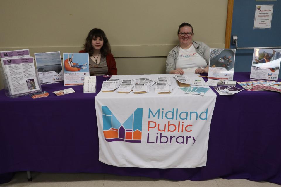Midland Public Library staff at their indoor booth
