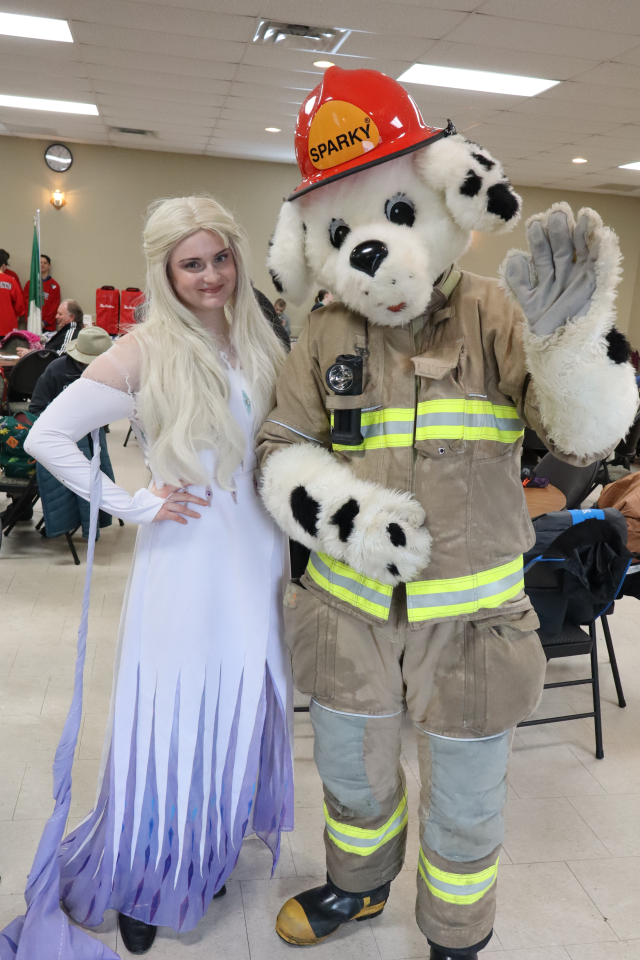Elsa from Frozen and Sparky the fire dog