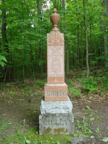 a tall headstone with the name 'Gidley' 