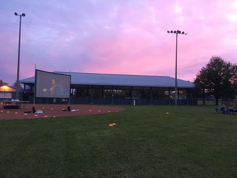 Movie screen set up outside in Perkinsfield Park