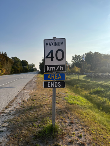 image of a speed limit street sign indicating a 40km/hr area ends