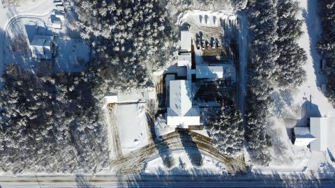 image of an aerial photo of the township office during winter with snow on the ground