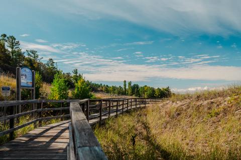 image of the boardwalk leading down to bluewater beach 