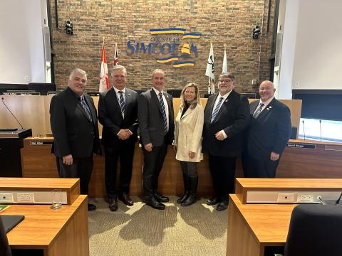 Mayor Evans Deputy Mayor Miskimins and other County Council posing for a photo