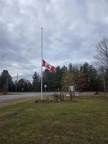 canadian flag lowered to half mast