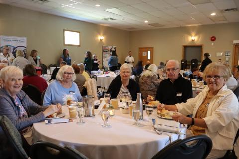 Table of Senior Symposium participants enjoying lunch