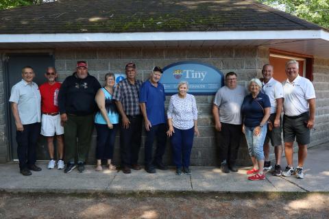 Members of Council, the Parks and Recreation Advisory Committee, Larry Patenaude and some of their family and friends posing with the newly unveiled Toanche Park Larry Patenaude Ball Diamond sign